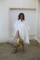 Off-white Saona beach cover-up by ANA + MARIA featuring lightweight fabric and casual style for beach or poolside wear.
