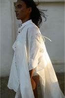 Off-white Saona beach cover-up by ANA + MARIA, lightweight and flowy fabric ideal for beach or poolside wear.