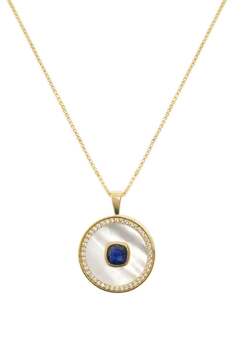 September birthstone sapphire necklace by Freya Rose featuring a vermeil gold chain and a mother-of-pearl pendant.