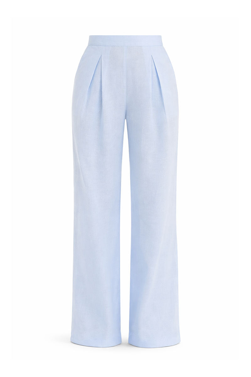 Baby blue SARENA pants by Maylé Vásquez, stylish and comfortable pants for toddlers, shown in a natural candid shot.