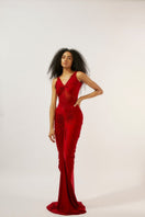 Deme By Gabriella Savannah Maroon Ruched Gown displayed on a model, featuring a flowing silhouette and elegant ruched detailing.