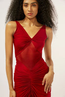 Deme By Gabriella Savannah Maroon Ruched Gown displayed on a hanger with draped fabric and elegant ruching details.