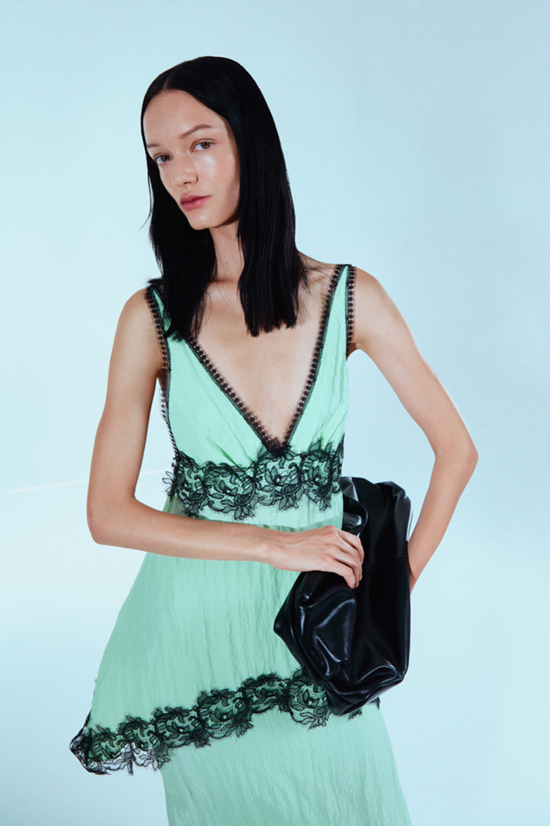 Mint and black lace top by Sayya, featuring delicate lace details and a stylish fit, perfect for casual or dressy occasions.