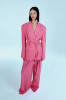 Pink Palazzo Pants by Sayya featuring flowy fabric and wide-leg design, styled for a casual or dressy look.