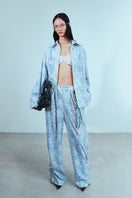 Soft blue patterned Sayya shirt with long sleeves and button-up front, casual and stylish for everyday wear.