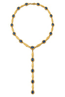 Jude Benhalim Poise Necklace featuring a delicate chain and elegant pendant, displayed on a neutral background.