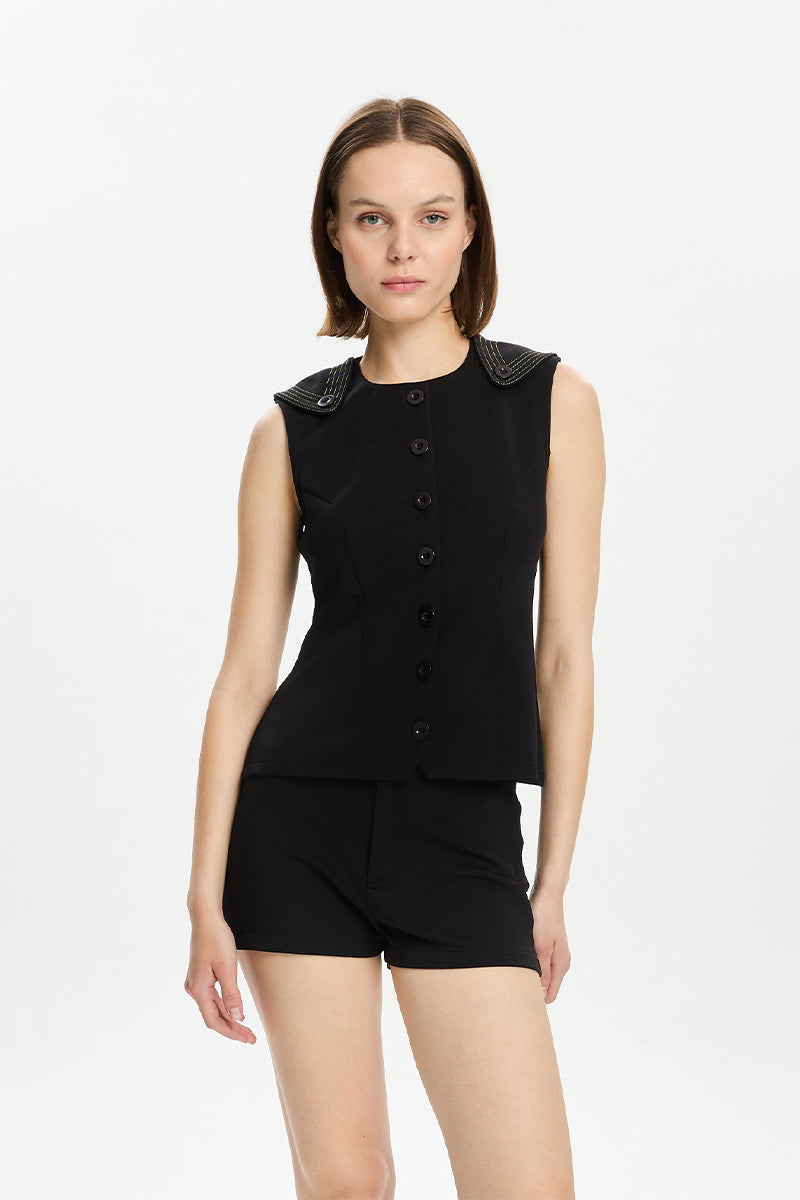 Black Bassigue scuba button-down vest, a stylish and versatile top with a sleek design and front button closure.