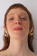 Gold Sculpt S earrings by Oz Objects, featuring sleek, modern design with smooth sculpted curves and a polished finish.