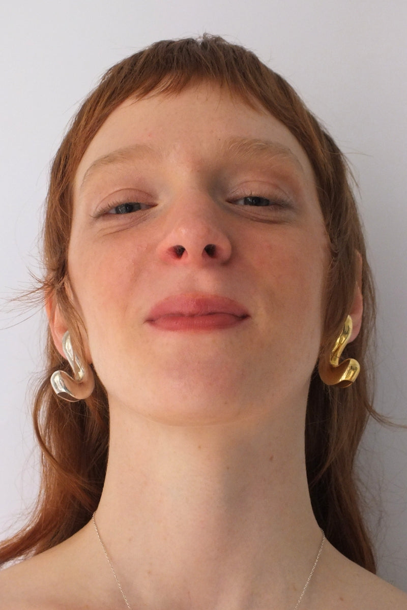 Gold Sculpt S earrings by Oz Objects, featuring sleek, modern design with smooth sculpted curves and a polished finish.