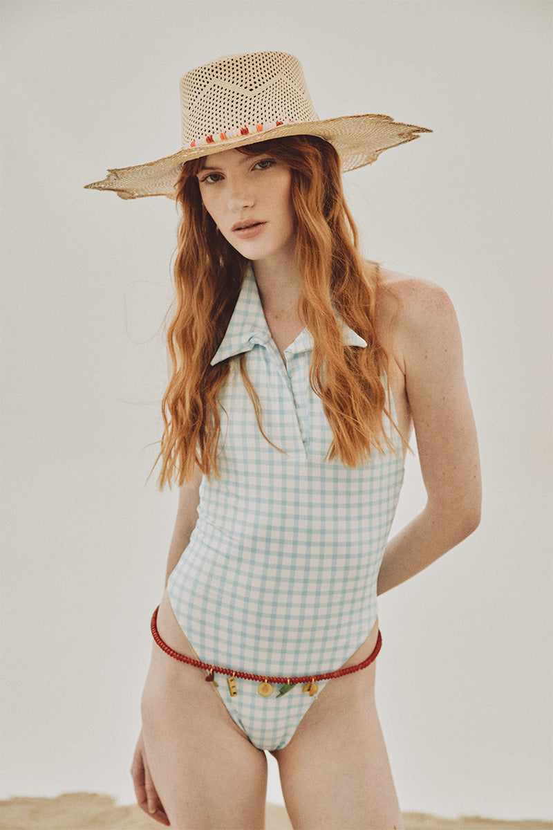 Ser Secrets of Bloom hat featuring a stylish, wide-brim design with floral accents, perfect for fashion-forward outdoor wear.