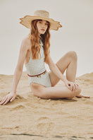 Ser Secrets of Bloom hat featuring a stylish, wide-brim design with floral accents, perfect for fashion-forward outdoor wear.