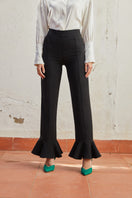 Black Eugenia pants by Señorita featuring a sleek, tailored fit and stylish design, displayed on a neutral background.