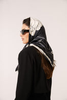 Black Señorita Luisa scarf made of soft fabric, featuring a stylish design perfect for layering and added warmth.