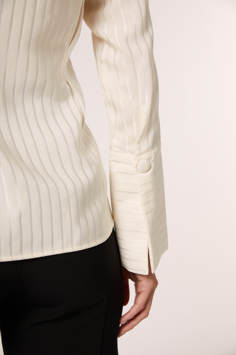 Ivory Alba blouse by Señorita, stylish shirt with elegant design, shown in a close-up image.