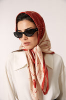 Red Señorita Luisa scarf featuring soft fabric and stylish design, perfect for adding a touch of elegance to any outfit.