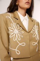 Beige Señorita Lara blazer displayed on a mannequin, showcasing tailored fit and classic blazer style for women.