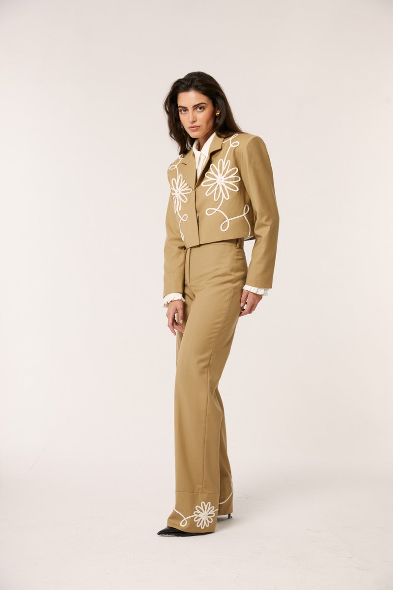 Beige Señorita Lara blazer with tailored fit, lapel collar, and structured design, perfect for professional or casual wear.