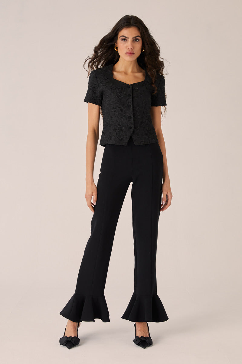 Black Eugenia pants by Señorita, stylish women's pants with a tailored fit, shown in the product image.