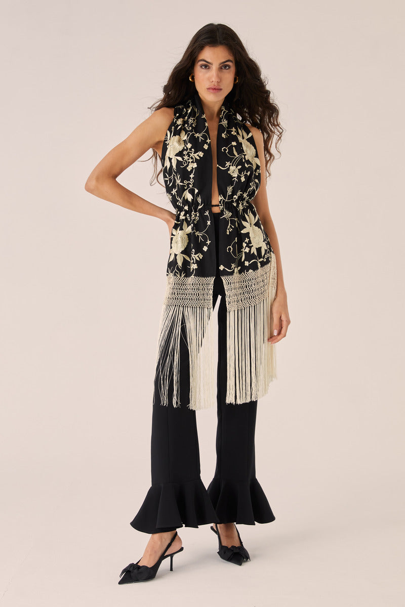 Black Señorita Rocio top featuring sleek fabric and stylish design, perfect for casual or dressy outfits.