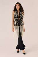 Black Señorita ROCIO top, stylish women's blouse with feminine details, displayed on a hanger against a neutral background.