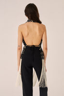 Señorita ROCIO black top with a stylish, fitted design, shown on a model featuring long sleeves and a modern silhouette.