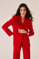 Red Señorita Teresa blazer shown on a model, featuring tailored fit and stylish lapel design.