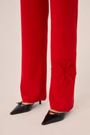 Red Teresa pants by Señorita featuring a stylish, tailored design perfect for casual or dressy occasions.