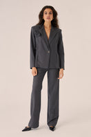 Señorita Adriana gray blazer, stylish tailored jacket with a sleek fit, displayed on a hanger against a neutral background.