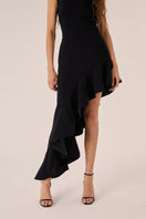 Black Señorita Olivia maxi dress displayed on a model, featuring a flowing silhouette and elegant design.