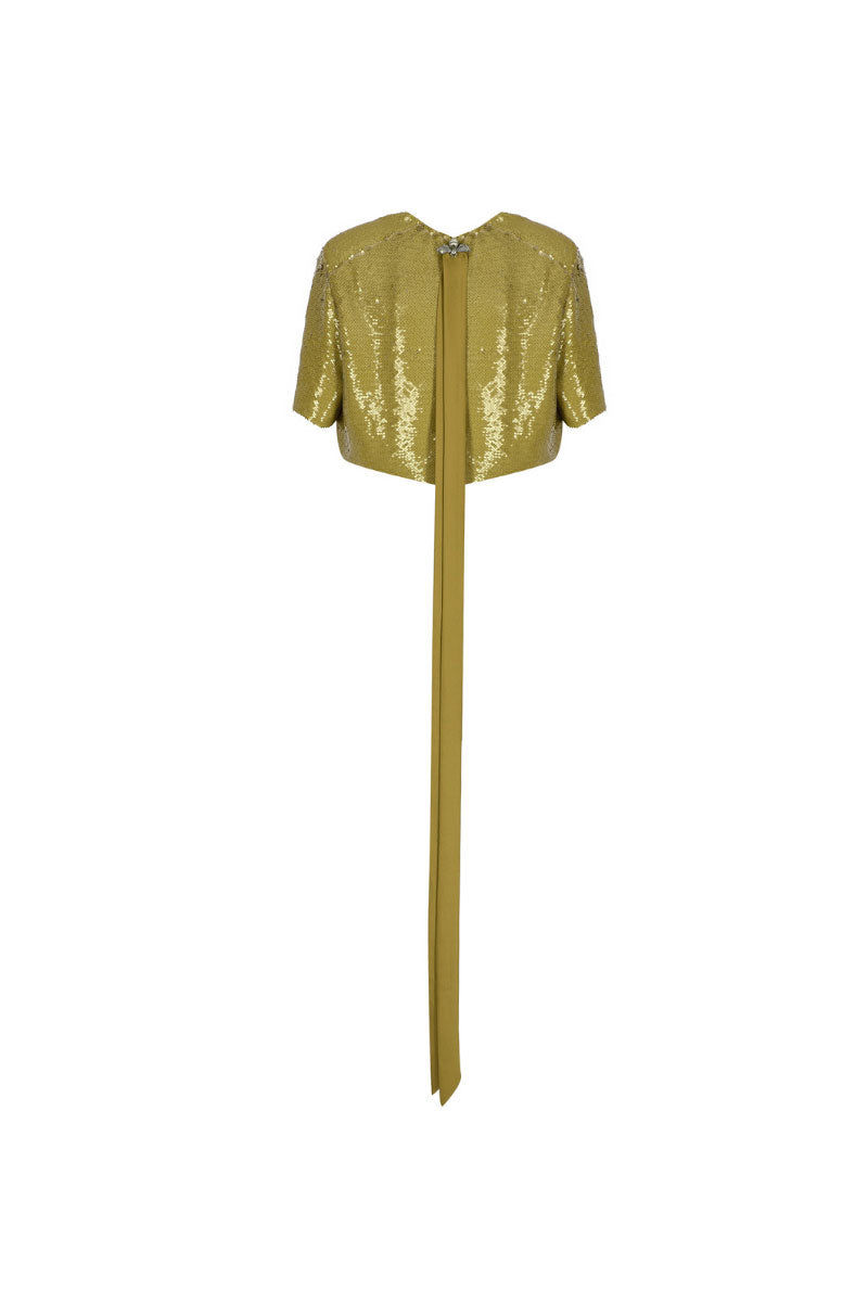 Green sequin back-slit top by Tayfun Kaba, featuring shimmering sequins and a stylish slit at the back.