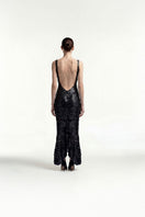 Black sequin plunge evening midi dress by Tayfun Kaba, featuring a fitted silhouette and elegant design for special occasions.