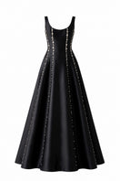 Black Seraphine gown by Nihan Peker, elegant long dress with flowing fabric and subtle detailing, suitable for formal occasions.