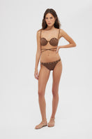 Brown Serein bikini set by Maliluha with triangle top and matching bottoms, shown on a model.