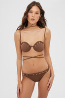 Maliluha Serein bikini set in brown displayed on a model, featuring a stylish two-piece swimwear with minimal design and adjustable straps.