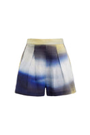 Maylé Vásquez Serenito shorts with a vibrant waves print, showcasing lightweight fabric and casual summer style.