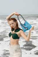 Blue and black Serpent Small shoulder bag by SAC DE SOUL with sleek design and adjustable strap.