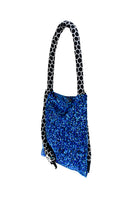 Small blue and black Serpent shoulder bag by SAC DE SOUL, featuring a sleek design and side view.