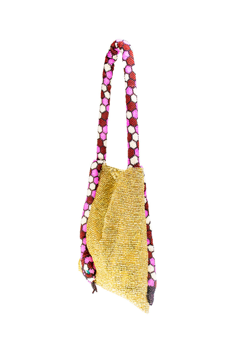 Serpent small gold shoulder bag by SAC DE SOUL with pink and white accents, featuring a sleek, stylish design.