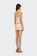 Beige shell bustier top by Stolen Stores featuring a fitted design and shell-inspired details, perfect for stylish outfits.