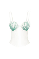Off-white shell hand-embroidered bustier top by Stolen Stores, featuring intricate embroidery and fitted design.