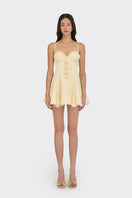 Light yellow shell mini dress by Stolen Stores featuring a fitted silhouette and stylish design, perfect for casual or summer wear.