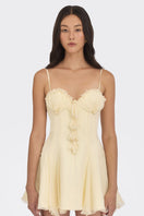 Yellow shell-embellished mini dress by Stolen Stores, featuring a fitted silhouette and stylish design.