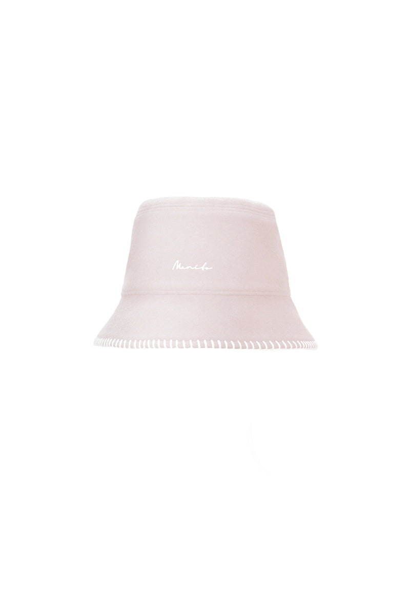 Pink Shell women's silk wool bucket hat by MANITO, featuring a stylish and soft hat with a wide brim and cozy texture.