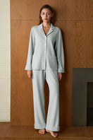 Blue Shell Women's silk wool pajama set by MANITO, featuring a comfortable, stylish design with long sleeves and matching pants.