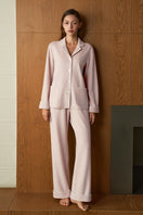 Pink Shell women’s silk wool pajama set by MANITO, featuring comfortable, luxurious sleepwear with a soft, silky fabric and relaxed fit.