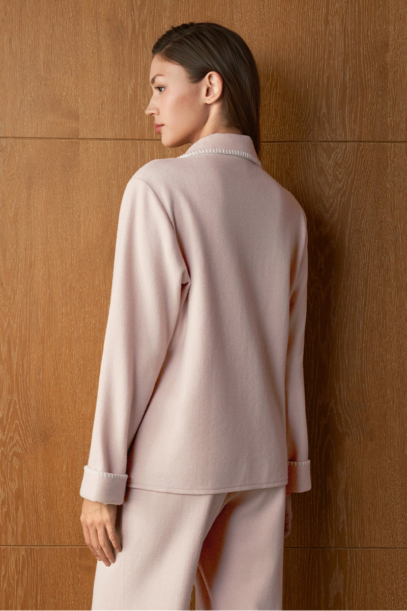 Pink silk and wool women's pajama set by MANITO featuring a comfortable, stylish design perfect for relaxing at home.