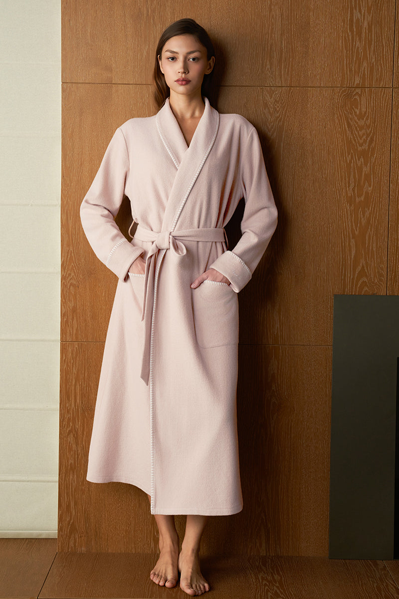 Pink Shell women's silk wool robe by MANITO, soft and luxurious fabric, shown draped elegantly on a model.