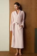 Pink Shell women's silk wool robe by Manito, showing soft fabric and relaxed fit in a cozy, elegant design.