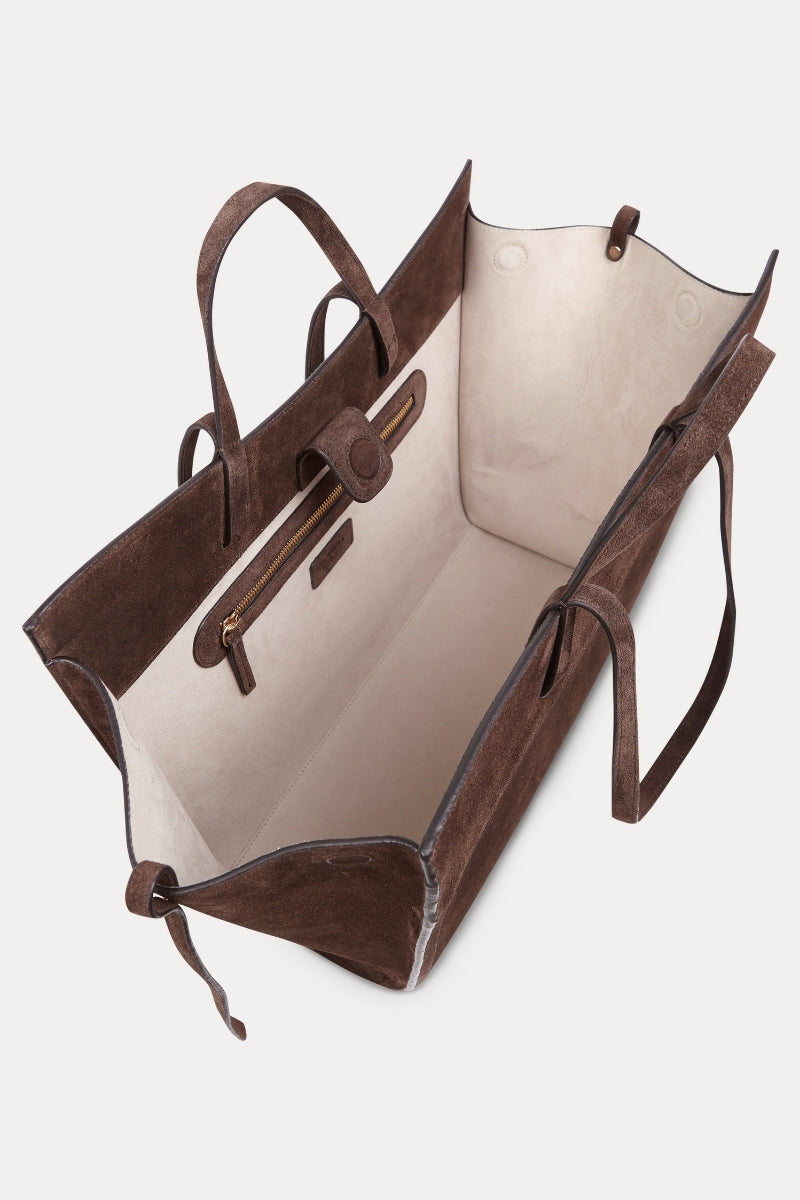 Saonara chocolate suede shoulder shopping bag with sleek design and soft texture, featuring a spacious interior and stylish look.