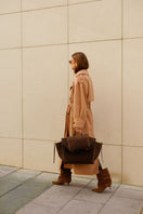 Saonara chocolate suede shoulder shopping bag with sleek design and sturdy handle, perfect for everyday use.